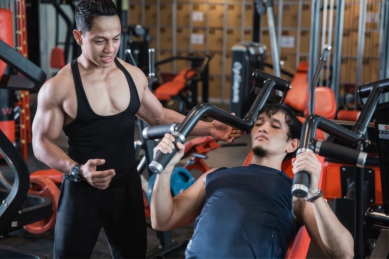 Athlete doing chest exercises at the gym
